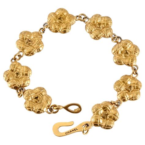 chanel camellia gold necklace|Chanel camellia bracelet.